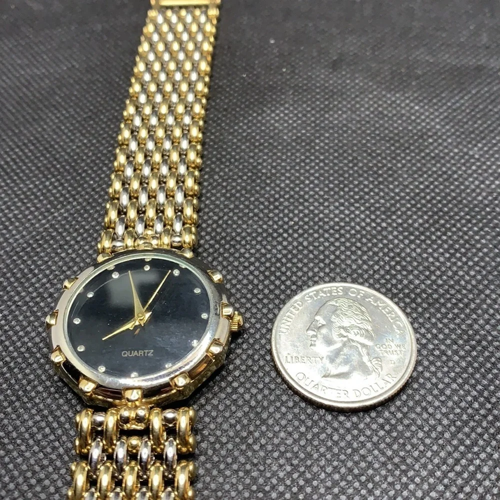 3/$27  Fashion watch with subtle two tone band